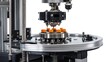 © Andrew - Precision Rotary Indexing Table: A close-up view of a high-tech rotary indexing table in action