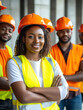 © The Stock Photo Girl - A group of construction workers posing, showcasing teamwork and professionalism.