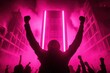 © good everyday - Silhouetted figure with arms raised in celebration against a backdrop of a tall building lit up with pink neon lights.