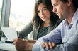 © BuyoutReese05/peopleimages.com - Business, people and meeting with legal document at office for explaining contract with terms and conditions. Corporate, employees and discussion at workplace with paperwork, advice and agreement