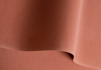 Aufkleber - Designer paper background with a warm, velvety texture in rich earthy tones of terracotta, copper, and ochre. This abstract, minimalistic surface features wavy, curved overlays