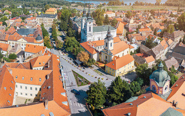 Wall Mural - A panoramic aerial view of Sremski Karlovci highlights the stunning summer landscape, with its unique heritage and vibrant urban center nestled in Vojvodina, Serbia