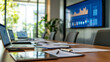 © ImageKing - A sleek, modern meeting room with a large conference table. Papers, laptops, and a big TV screen displaying company growth data are spread across the table.