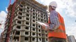 © AlfaSmart - Construction Worker Inspecting Building Site