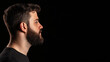 © Wonderful Studio - A profile view of a man with a beard against a dark background, showcasing facial features and hairstyle prominently.