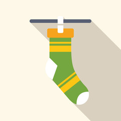 Canvas Print - Green sock with yellow stripes hanging on a clothesline with a clothespin, suggesting laundry and clothing care