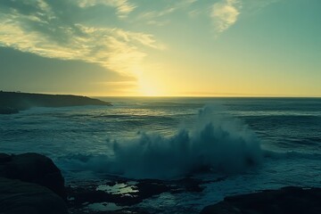 Wall Mural - crashing waves at sunset over rocky shoreline