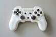© juliars - White video game controller resting on a gray surface, representing gaming and entertainment