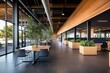 © Tondone - Modern office interior with open space design, featuring natural light, greenery, and sleek furnishings enhancing work productivity and comfort.