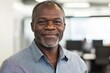 © Cetin - Middle-Aged African American Man in Office Setting