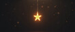 © Юрій Тарасовський - Gold Star Light Hanging on Dark Background