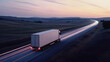 © Concept Photo Studio - Camion roulant sur une route de campagne le soir