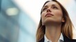 © WS Studio 1985 - Thoughtful Slovak Businesswoman Gazing Upwards, Reflecting on Future Opportunities Against a Modern Urban Background