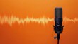 © mediavn - Professional microphone with waveform on orange background banner, podcast or recording studio background