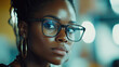 © boxstock production - Focused African American businesswoman with glasses in a modern setting