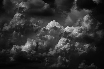 Wall Mural - black white dark grey sky with clouds. dramatic background. thunderstorm storm hurricane rain wind t