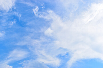 Wall Mural - beautiful blue sky and white fluffy group of clouds with sunrise in the morning, natural background