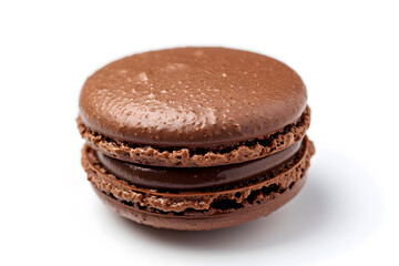 Classic chocolate macaron with smooth brown shell and rich creamy filling isolated on white