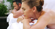 © peopleimages.com - Massage, relax and wellness with couple at spa together for holistic or stress relief treatment. Health, luxury or satisfaction with man and woman on table at beauty salon or resort for therapy