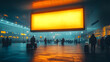 © FU - A blank billboard stands prominently at a busy airport terminal with people walking around, ready for advertising display; this image captures a high-traffic public space, symbolizing marketing potent