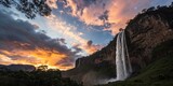Breathtaking Silhouette Photography of Salto Angel Waterfall at Sunset with Dramatic Clouds and Vibrant Colors, Capturing Nature's Majesty and Serenity in a Stunning Scene
