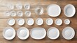 © pinporn manosri - Aerial View of White Dinnerware Set Including Plates, Bowls, and Glasses Arranged on a Rustic Wooden Table Top for Elegant Dining Experience