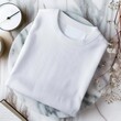 © DigitalArt - Blank sweater folded neatly on marble table high contrast lighting top-down perspective elegant display mock up