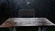 © LipskiyS - Wooden chair and table under rain