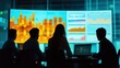 © kwangze - Team analyzing data visualizations on large screens in a dark room.