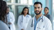 © forenna - Arab Doctor Leading Diverse Medical Team in Hospital Setting