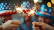© Jiraphat.N - Celebrate united states independence day with friends sparklers and patriotic hats