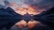 © Watanabe - A serene lake reflects the vibrant hues of a stunning sunset, framed by snow-capped mountains.