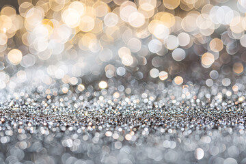 Wall Mural - the image is a blurry, abstracted view of a silver and gold background with a lot of small, round sh