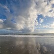 © JT's Salty Lens - beach and ocean landscape with clouds and reflections