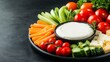 © จิดาภา มีรีวี - Fresh vegetable and cheese platter with creamy dip