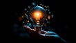 © MSH - Hand holding an illuminated light bulb with digital icons, Business idea light bulb with technology icon