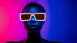 © Nongluk Tama - Silhouette of a futuristic figure wearing LED glasses, illuminated by intense artificial lighting, vibrant colors