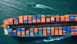 © Pattara - A detailed aerial view of a busy shipping port, where vibrant containers are neatly stacked, large cargo ships are docked, and cranes are actively loading