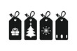 © Jannatul - A set of four Christmas present tags in silhouette black color vector art illustration.
