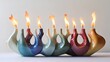 © Tcukimay - A colorful, abstractly shaped menorah with eight lit candles.