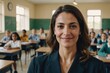 © ThomasLENNE - Close portrait of a smiling 40s Algerian female elegant school teacher standing and looking at the camera, indoors almost empty primary school classroom blurred background