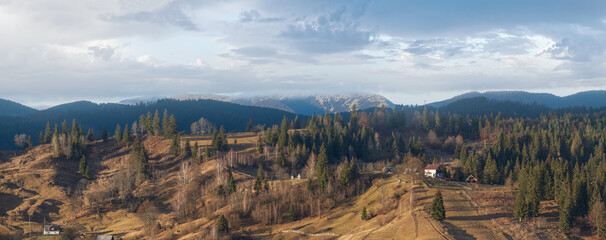 Wall Mural - Picturesque morning above late autumn mountain countryside.  Ukraine, Carpathian Mountains. Peaceful traveling, seasonal, nature and countryside beauty concept scene.