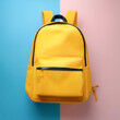 © Saddha Visual - Yellow backpack, School backpack, isolated on a Soft blue and Pink Pastel