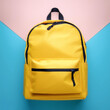 © SaddhaVisual - Yellow backpack, School backpack, isolated on a Soft blue and Pink Pastel