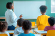 © Ирина Селина - An African American female teacher instructing a group of young students in a classroom with yellow chairs and a green chalkboard background