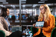 © DC Studio - Diverse business leaders in a meeting sharing ideas for corporate growth, analyzing infographics for a monthly report task. Powerful women working together to ensure business success, productivity.