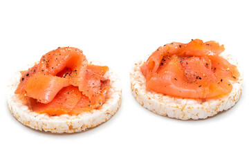 Wall Mural - Tasty Rice Cake Sandwiches with Fresh Salmon Slices Isolated on White. Easy Breakfast and Diet Food. Crispbread with Red Fish. Healthy Dietary Snacks - Isolation