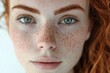 © LimeSky - A young woman with freckles and prominent eyebrows applies a moisturizing treatment for lifting and anti aging on a white background