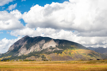 Wall Mural - Mount Crested Butte, Colorado village town in autumn at Rocky mountains with blue sky and mountain