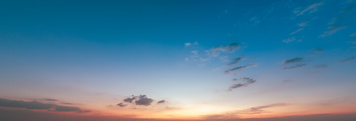 Wall Mural - sunset sky background in thailand,cloudscape time lapse background dark red purple sunset sky nature